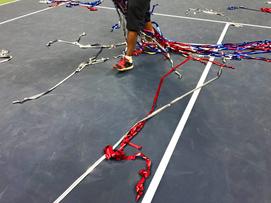 NEW YORK, NY - SEPTEMBER 11:  Streamers are cleaned up on center court after the trophy celebration for Stan Wawrinka defeating Novak Djokovic on Day 14 of the 2016 US Open at the USTA Billie Jean King National Tennis Center on September 11, 2016 in Queens.  (Landon Nordeman for ESPN)